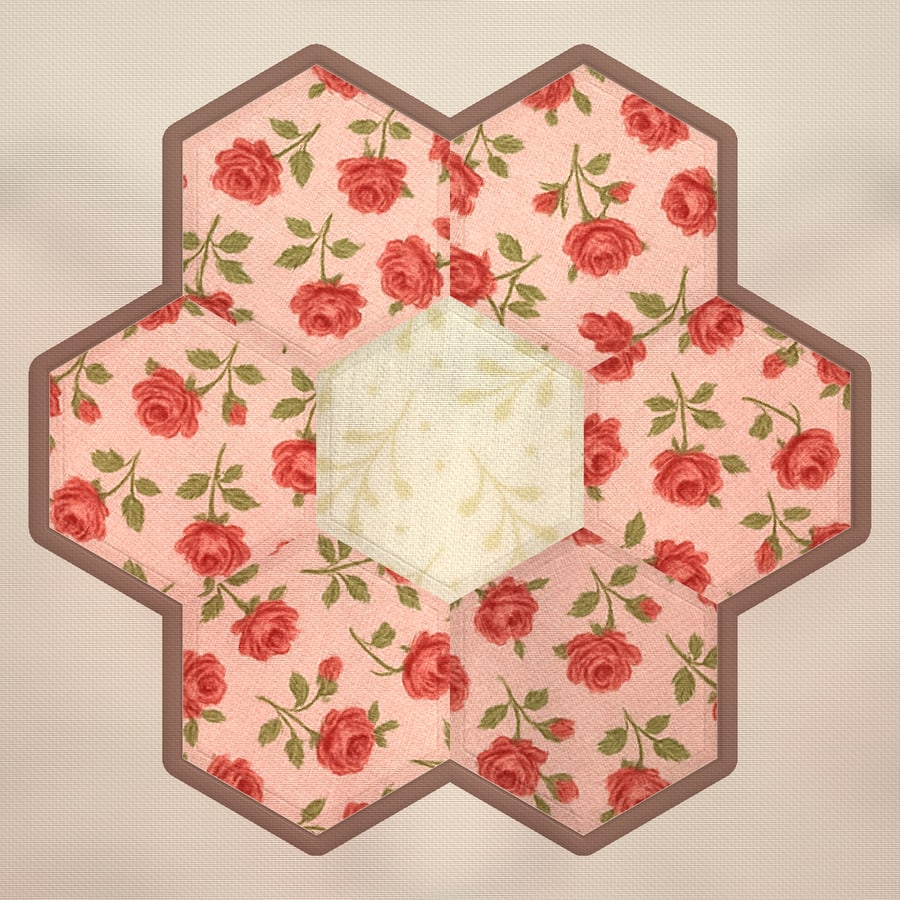 A seven-hexagon flower, bound as a mini quilt